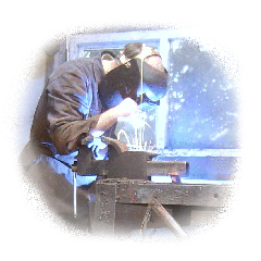 A web designer welding